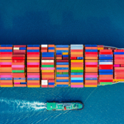 Aerial view of container cargo ship in sea.